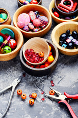 Wall Mural - Colorful beads in wooden bowls