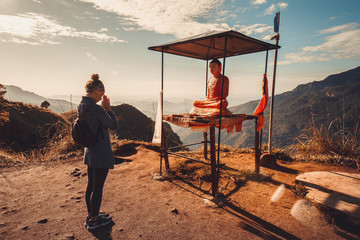 Girl traveler worships buddha