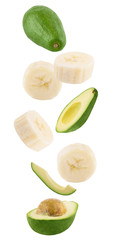 Sticker - Falling banana and avocado isolated on white background