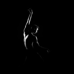 Wall Mural - Black and white silhouette of male ballet dancer.