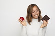 © Martin Villadsen - portrait of young woman with fruit and chocolate being tempted