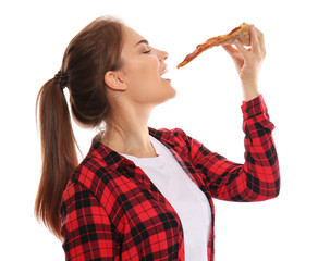 Wall Mural - Young woman eating slice of delicious pizza on white background