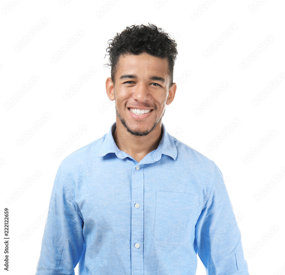 Handsome African-American man in formal clothes on white background