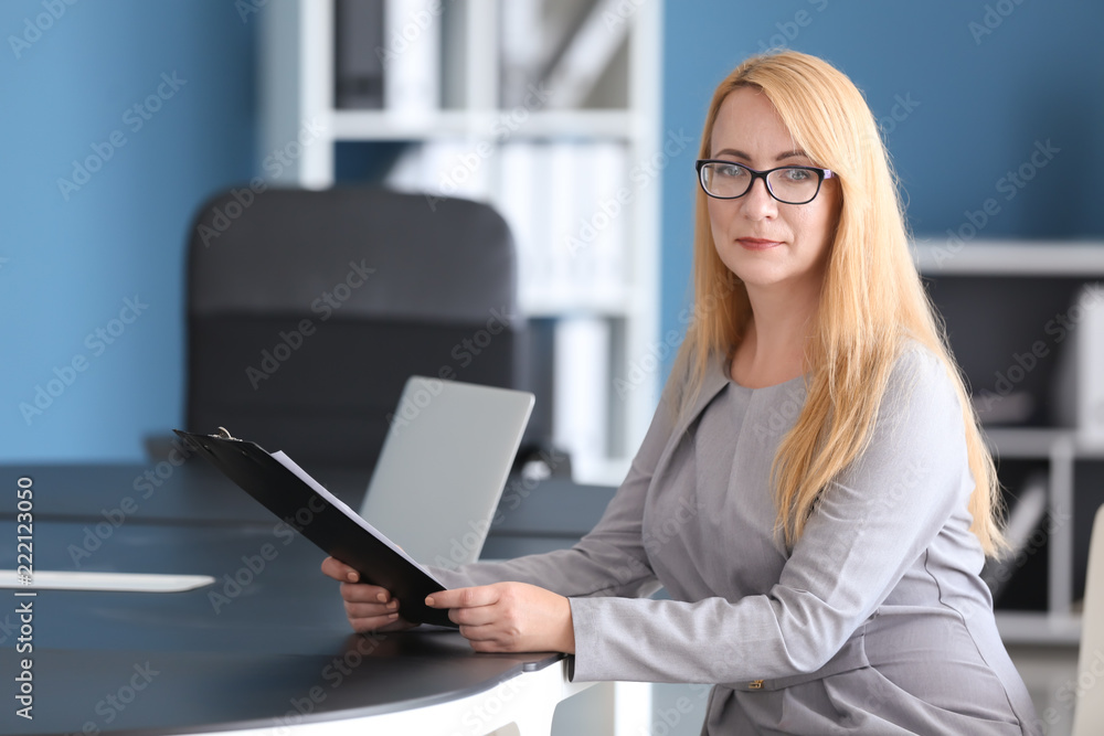 Stylish businesswoman working in office