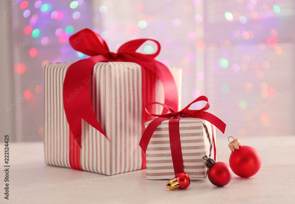 Beautiful Christmas gift boxes on white table