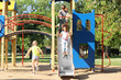 © Pixel-Shot - Cute little children having fun on playground outdoors