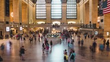 People And Tourists Walking In Grand Central Terminal In New York City. Slowly Zooming In.