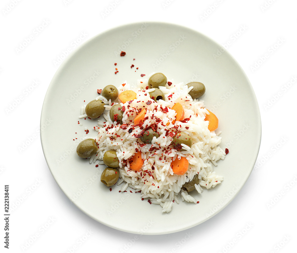 Plate with tasty boiled rice and vegetables on white background