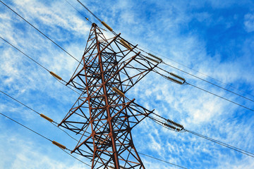 Image of high voltage power line and sky.