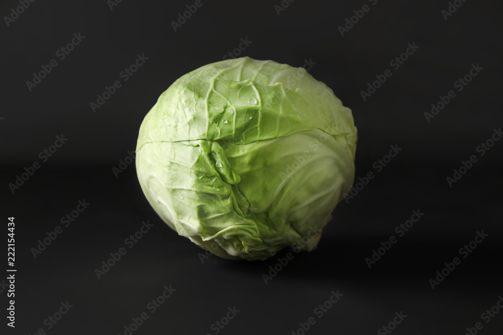 Fresh cabbage on dark background
