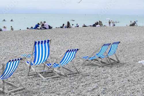 Blue Deck Chairs With People Relaxing On Brighton Beach England Uk Buy This Stock Photo And Explore Similar Images At Adobe Stock Adobe Stock