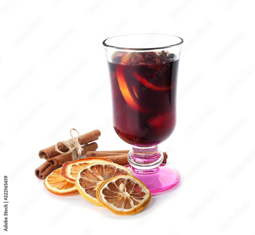 Glass of delicious mulled wine on white background