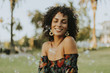 © Rawpixel.com - Beautiful woman posing in the park