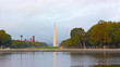 National Mall panorama in early morning. A view on national Monument from the reflection pool near US Capitol.