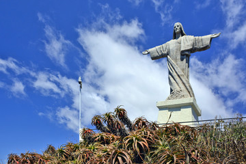 The Christ the King (Cristo Rei) statue is a Catholic monument in Ponto Garajau on Madeira island, Portugal