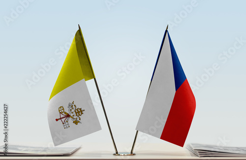 Photo Two flags of Vatican City (Holy See) and Czech Republic