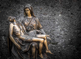 Wall Mural - Religious bronze statue representing the piety of Michelangelo