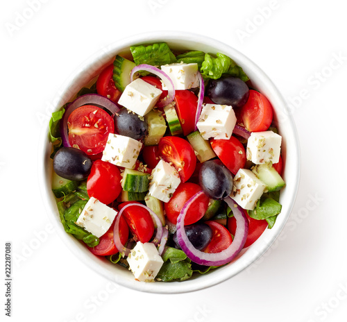 Photographie Greek salad in take away bowl on white background; from above