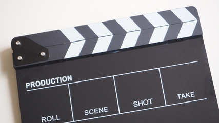 Clapper board or movie slate use in video production or movie and cinema industry. It's black color on white background.