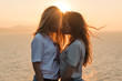 © Angel Ruiz Sanchez - Side view of couple standing outdoors during sunset