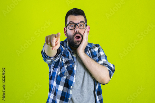 Photographie Portrait of young bearded man with shocked facial expression