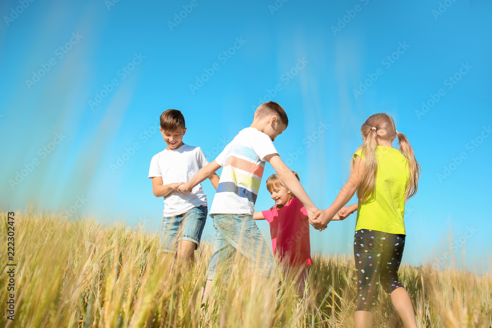 Cute little children playing in wheat field on sunny day - obrazy, fototapety, plakaty 