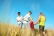 © Pixel-Shot - Cute little children playing in wheat field on sunny day