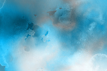 Blue winter watercolor ombre leaks and splashes texture on white watercolor paper background. Painted ice, frost and water.