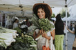 © Rawpixel.com - Beautiful woman buying kale at a farmers market