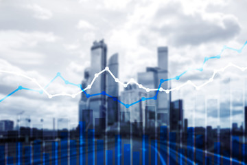 Double exposure financial graphs and diagrams.