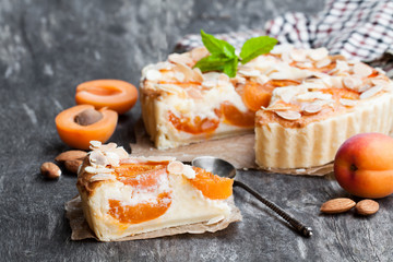 Wall Mural - Homemade  cheese cake with apricot on wooden table