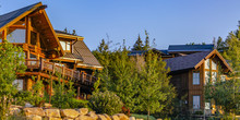 Two Cabins In Luxury Neighborhood At Sunset Pano