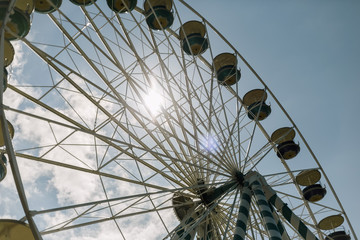 French ferris wheel on background of blue sky