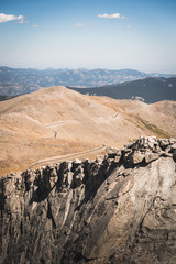 Scenic view of the hillside road leading towards Mount Evans in Colorado. 