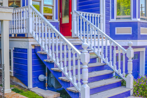White Outdoor Banister Blue House With Red Door Buy This Stock