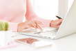 © Siam - Closeup female hands typing on laptop keyboard. Woman working at home office concept.