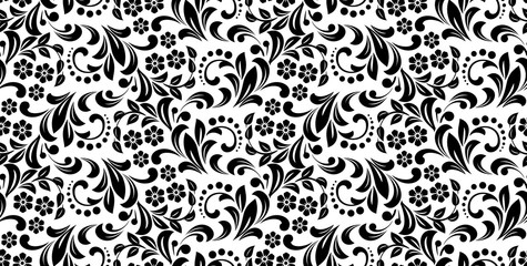 Flower pattern. Seamless white and black ornament. Graphic vector background. Ornament for fabric, wallpaper, packaging