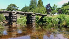 Pan From Right To Left Of Clapper Bridge At Postbridge In Dartmoor, UK