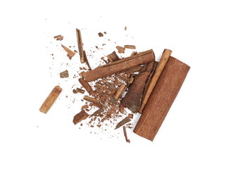 Canvas Print - Cinnamon sticks with shavings isolated on white background, top view