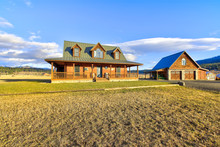 Nice Wooden Ranch Home With Beautiful Landscape In The Countryside.