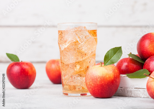 Cuadros en Lienzo Glass of homemade organic apple cider with fresh apples in box on wooden background