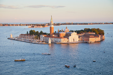 Wall Mural - San Giorgio Maggiore island and basilica aerial view in a sunny summer evening in Venice, Italy