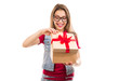 © Feodora - Excited woman opening present box