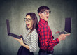 © Feodora - Surprised funny looking man and woman with new laptops