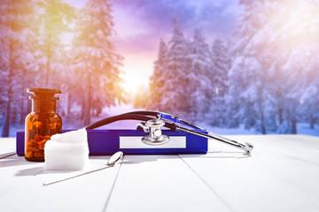 Sticker - a medical wooden table with winter season attributes  