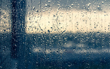 Horizont View Throught The Rain Drops On Window Glass