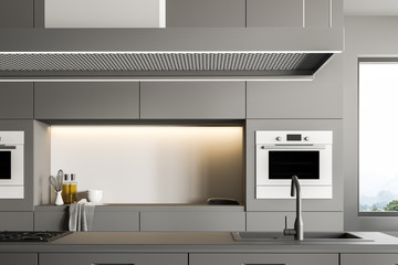 Gray modern kitchen interior, island close up