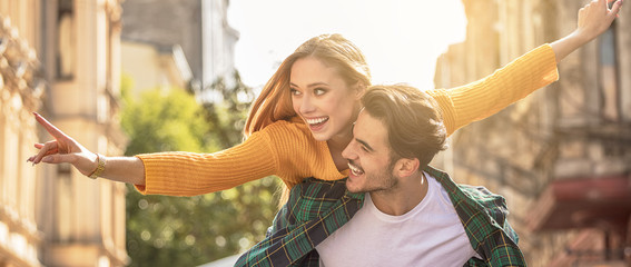 smiling beautiful couple dating outdoors.