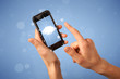 © ra2 studio - Female fingers touching smartphone with cloud concept