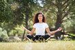 © javiindy - Young Arab woman doing yoga in nature